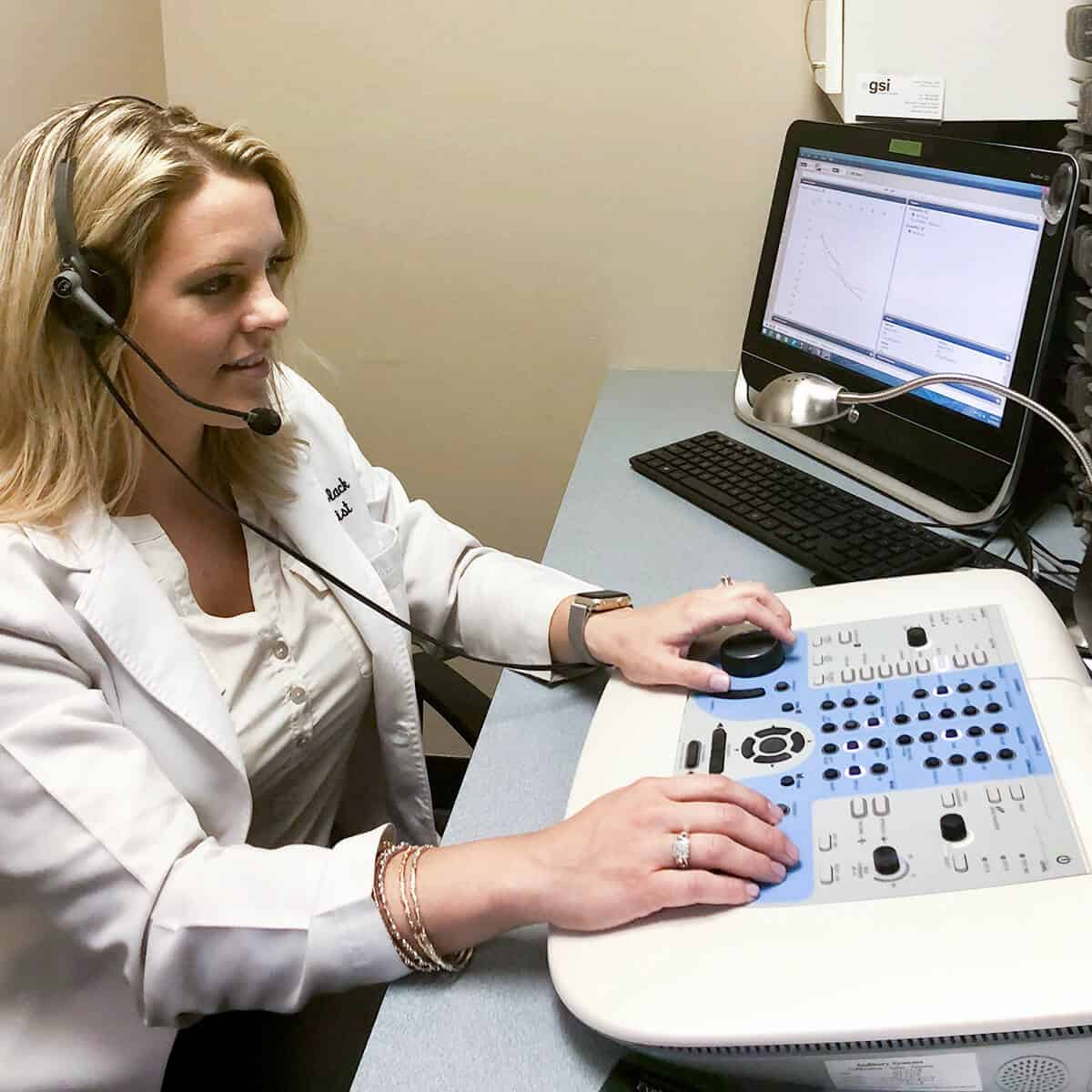 Hearing Services | Doctor using a machine